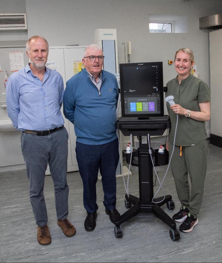 Representatives with the new mobile ultrasound machine